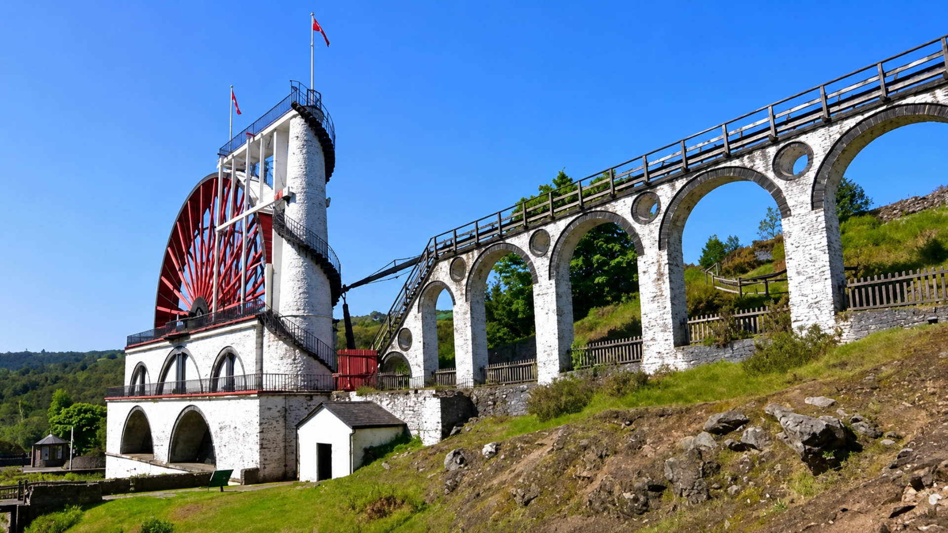 The Laxey Wheel and viaduct in the village of Laxey, Isle of Man